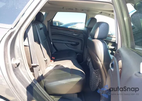 2015 Cadillac Srx Luxury Collection z USA, uszkodzony, nr VIN 3GYFNBE39FS558922